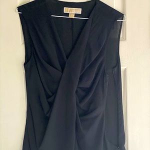 Sleeves black blouse with front detailing.